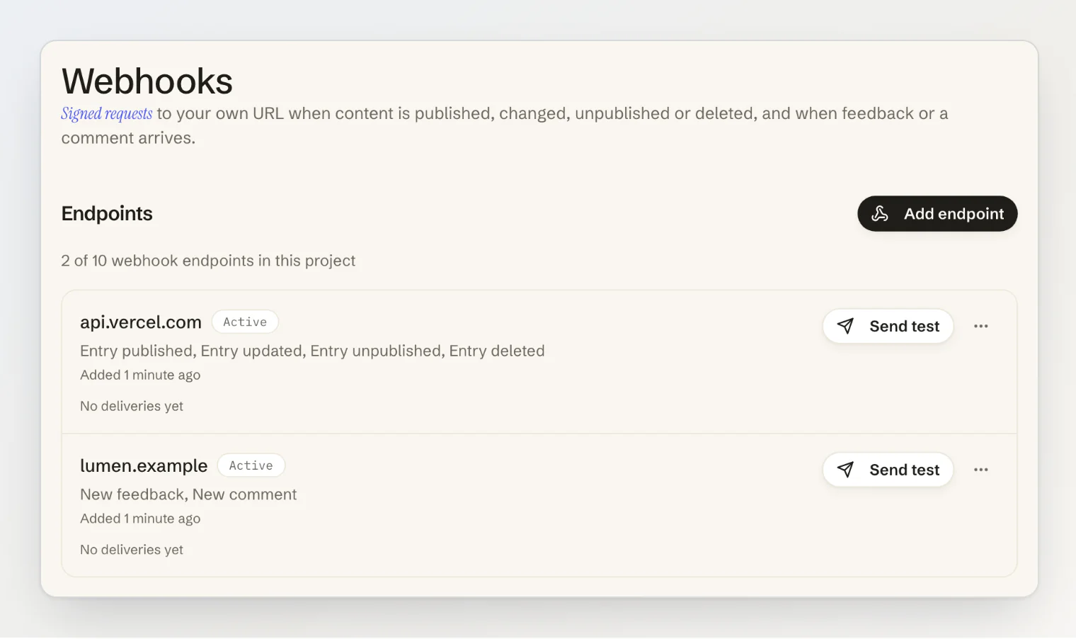 The Webhooks page with two endpoints: a Vercel deploy hook for the four entry events, and the site's own receiver for new feedback and comments
